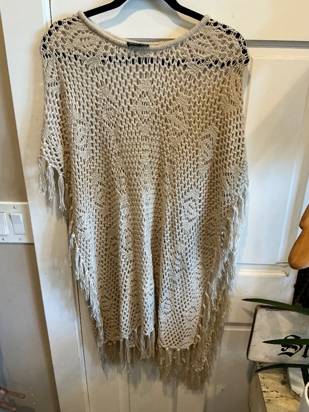 Crocheted poncho with fringe!  Open size